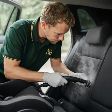 Steam-cleaning a fabric back seat